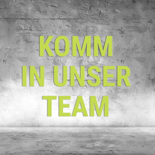 Komm in unser Team Schriftzug auf grauem Hintergrund.